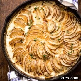 Creamy Au Gratin Potatoes with Kale and Gruyere cheese.