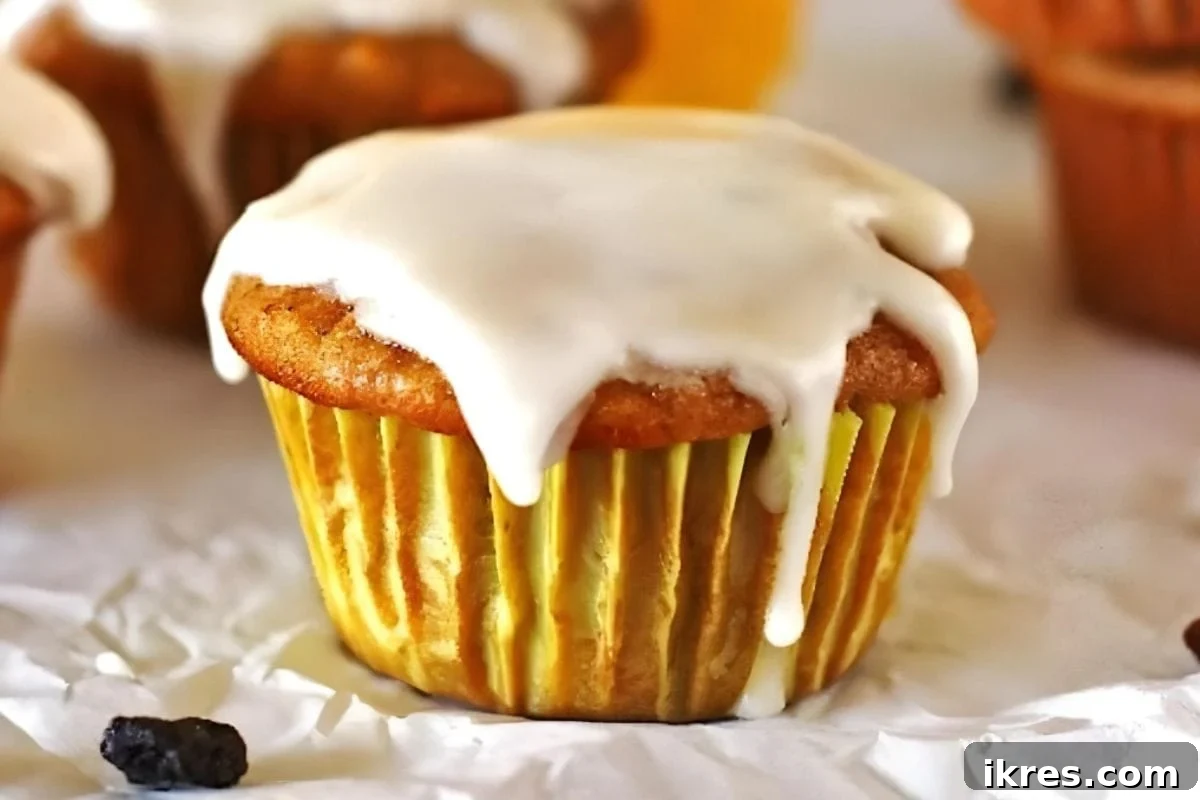 Delicious and moist Carrot Cake Muffins, thoughtfully made with applesauce for a naturally sweet, wholesome breakfast or brunch treat.