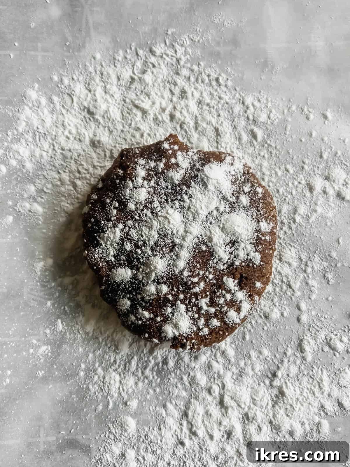Gingerbread dough on parchment paper with tapioca flour.