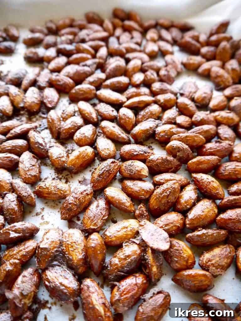 Gingerbread Roasted Almonds (Paleo, GF) - A delicious and healthy holiday snack with a crisp spiced candy coating.
