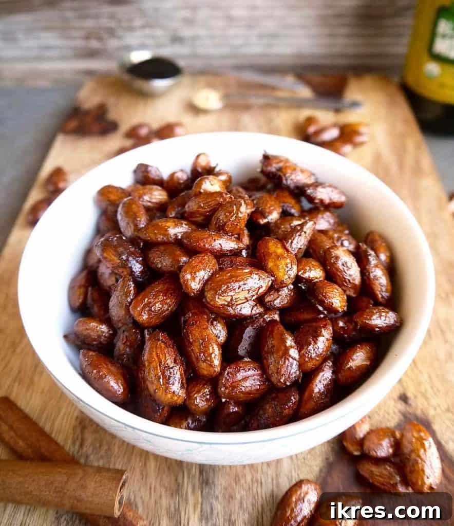 The simple process of making Gingerbread Roasted Almonds with maple and molasses glaze.