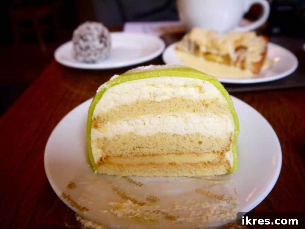 Stockholm: Sweden's Midnight Sun Capital 24 A slice of traditional Swedish Princess Cake, with its characteristic green marzipan and pink rose, at Cafe Kronan.