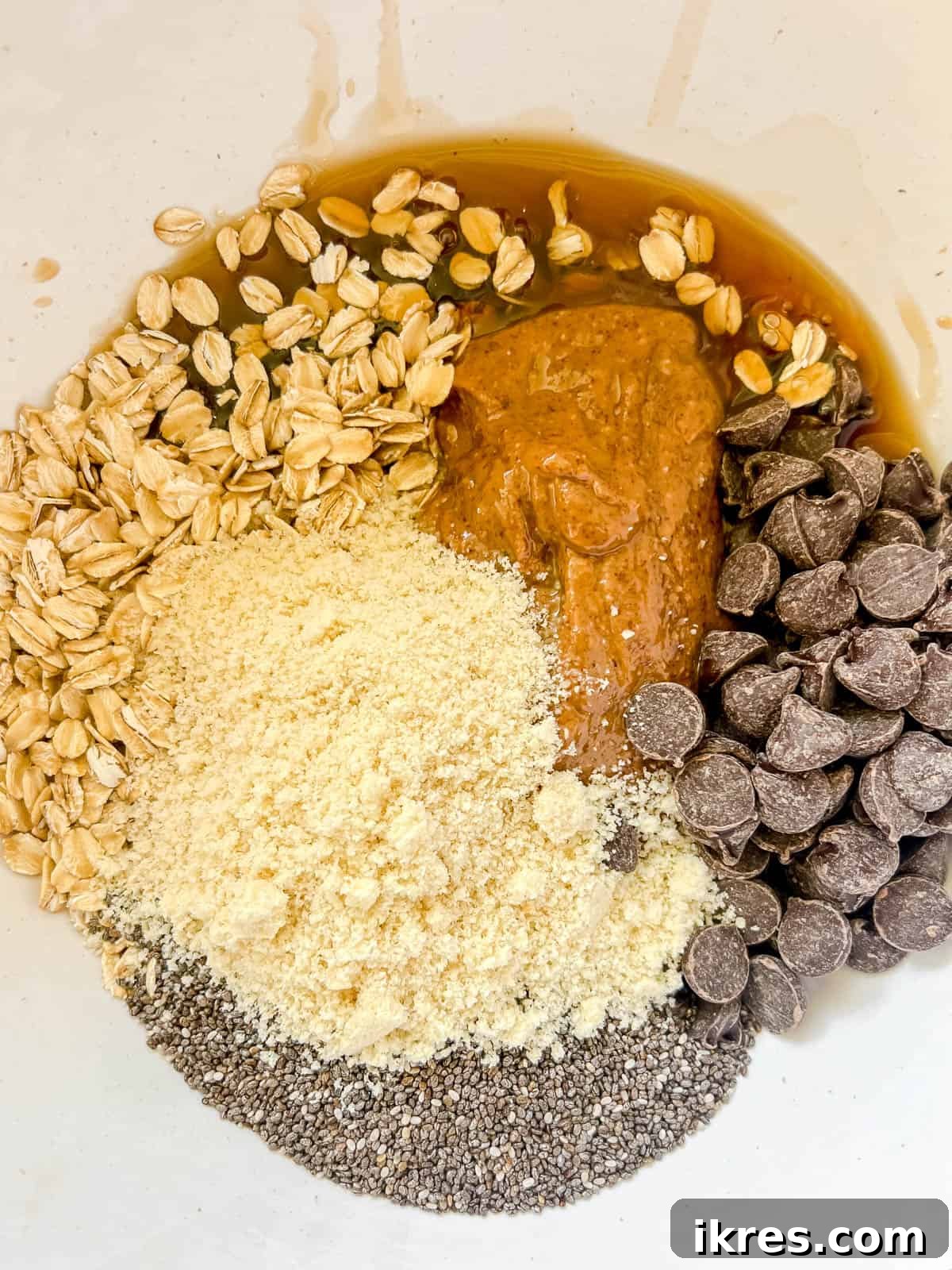 Chocolate Chip Chia Oatmeal Power Bites 4 All the energy ball ingredients added to a bowl.