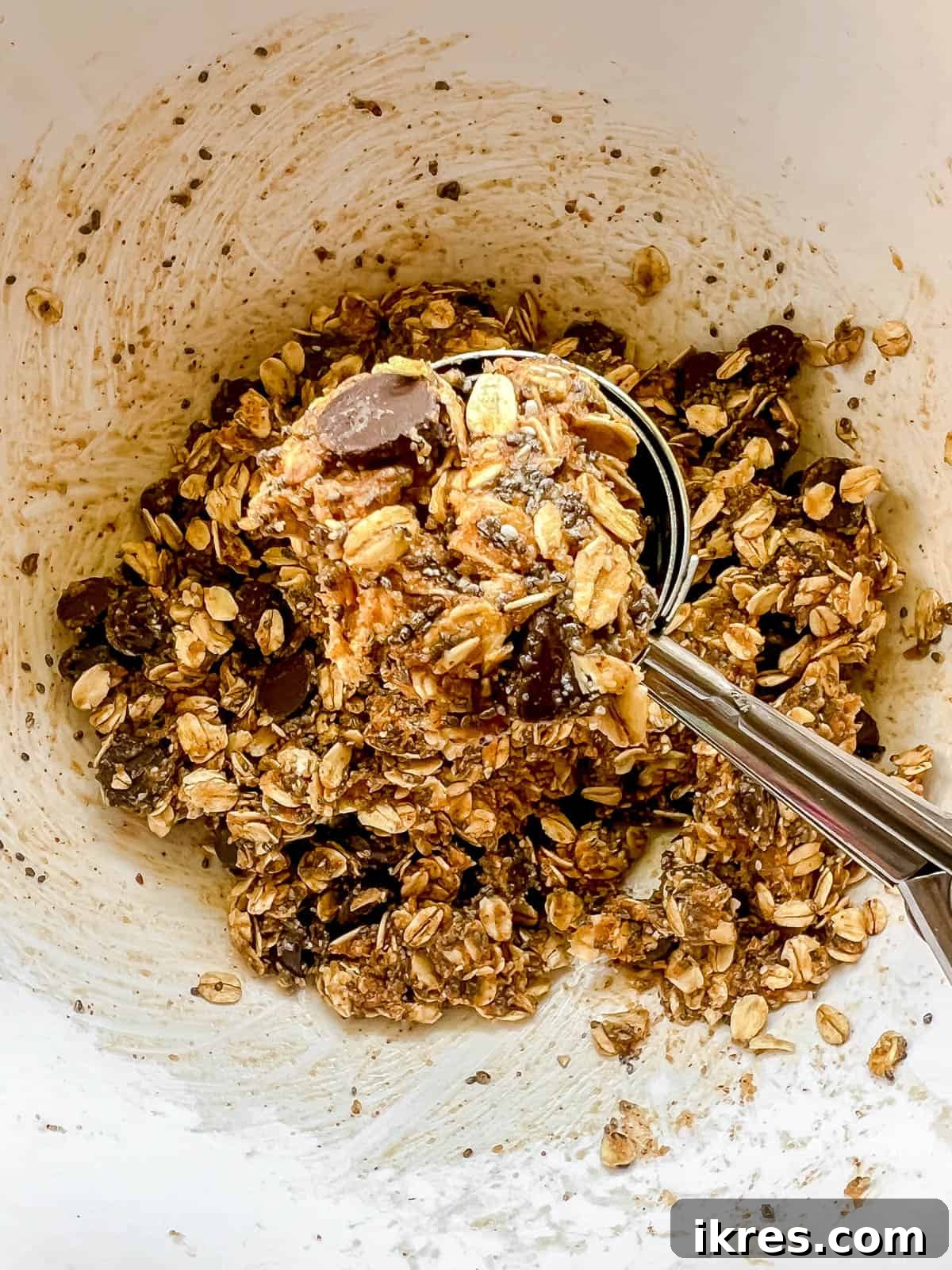 Chocolate Chip Chia Oatmeal Power Bites 6 Using a cookie scoop to roll out the energy balls.