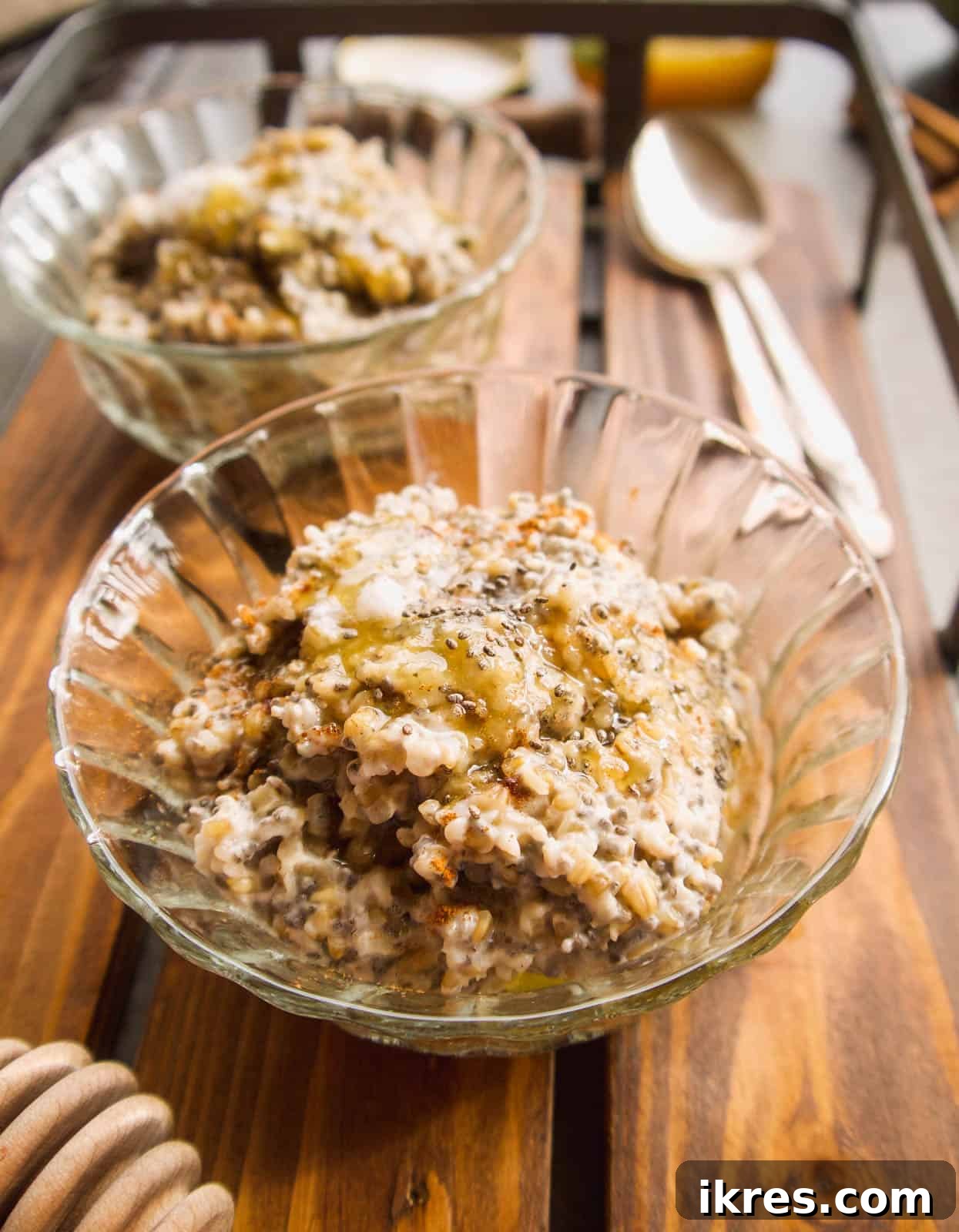 Wholesome Gluten-Free Steel Cut Oats with Chia and Coconut Oil 3 Two bowls of perfectly cooked steel cut oats with chia seeds, ready to be customized with delicious toppings.