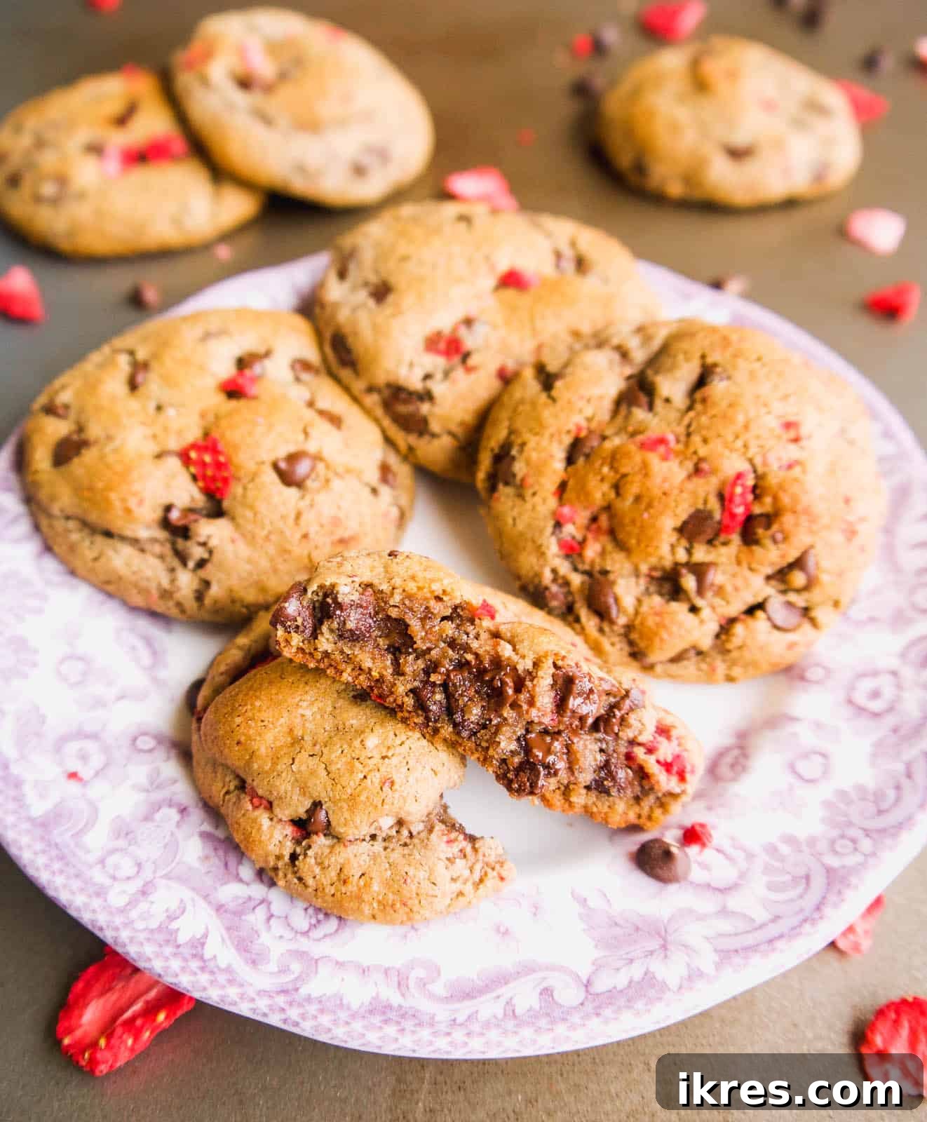 Strawberry Chocolate Chip Paleo Delights 12 A Paleo Strawberry Chocolate Chip Cookie neatly cut in half, revealing its perfectly moist interior, melted chocolate chips, and strawberry pieces.