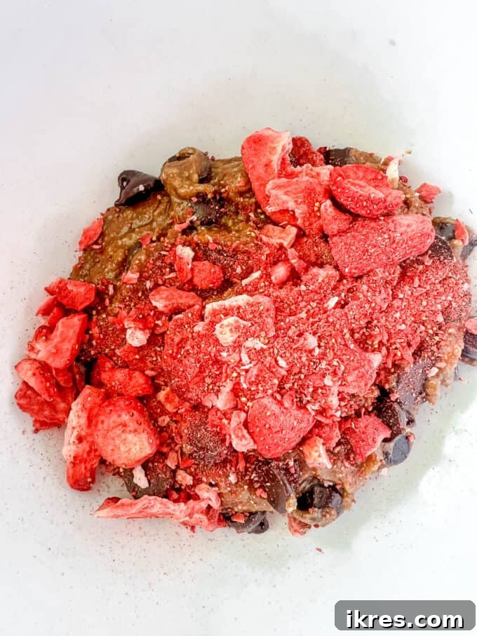 Strawberry Chocolate Chip Paleo Delights 8 Finely ground freeze-dried strawberries being folded into the cookie batter.