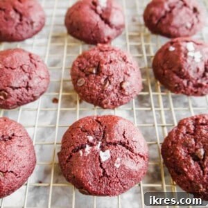 Gluten-free red velvet cookies on a drying rack.