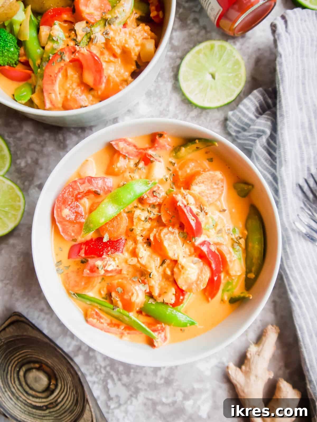 Plant-Based Paleo Thai Red Curry 2 Vibrant Vegan Thai Red Curry served in a beautiful bowl, garnished for freshness and ready to eat.