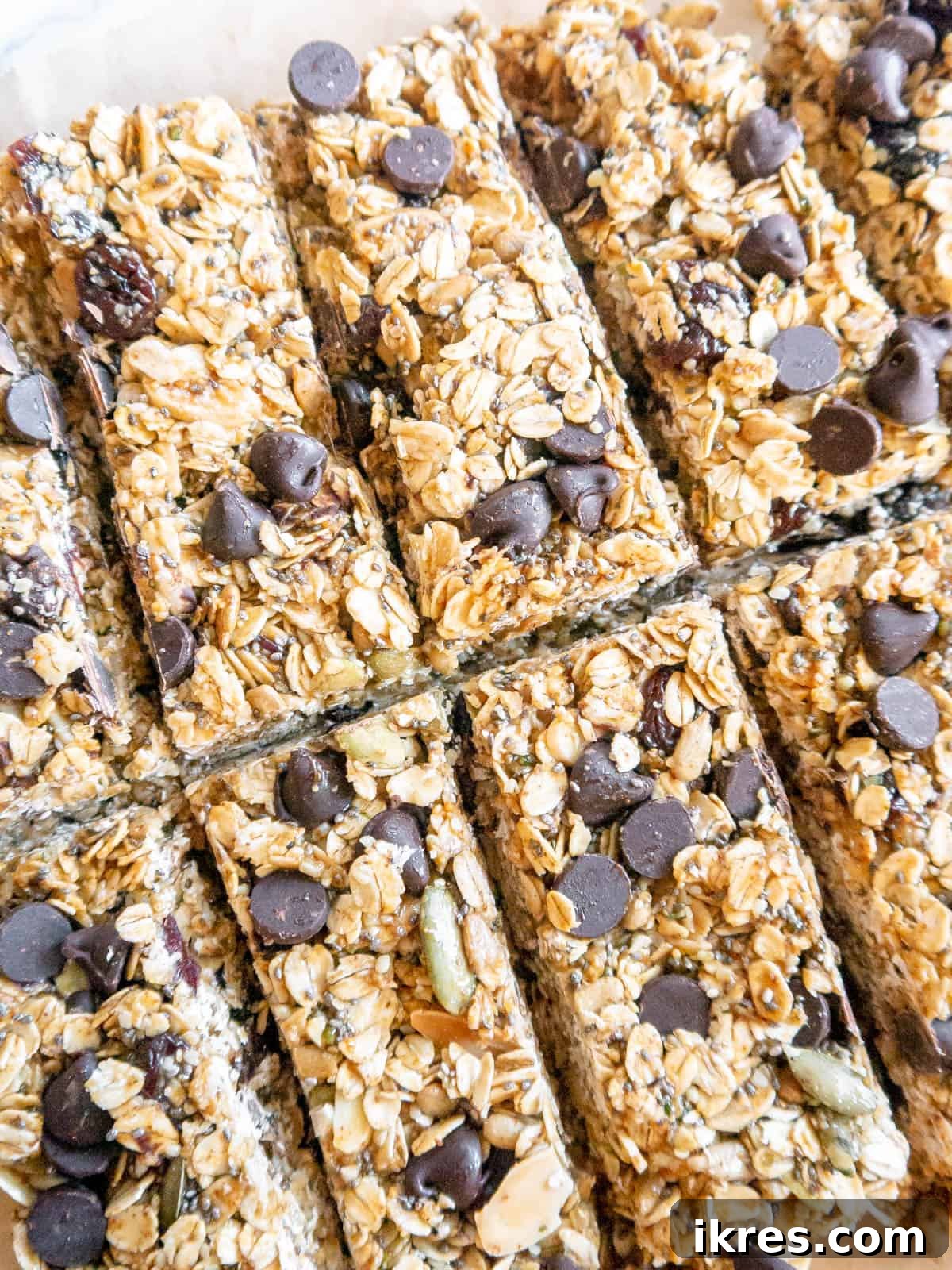 Effortless Gluten-Free Almond Butter Energy Bars 2 Two rows of no bake gluten-free almond butter granola bars, freshly cut and ready to eat.
