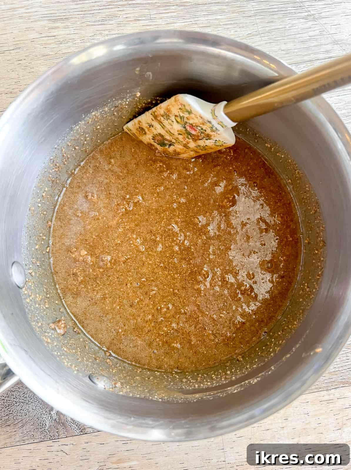 Effortless Gluten-Free Almond Butter Energy Bars 5 Melted honey and almond butter mixture in a saucepan.