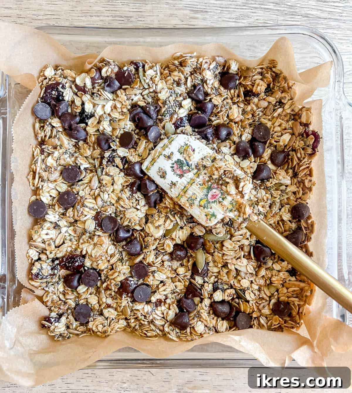 Effortless Gluten-Free Almond Butter Energy Bars 7 Almond butter granola bar mixture pushed firmly into a pan.
