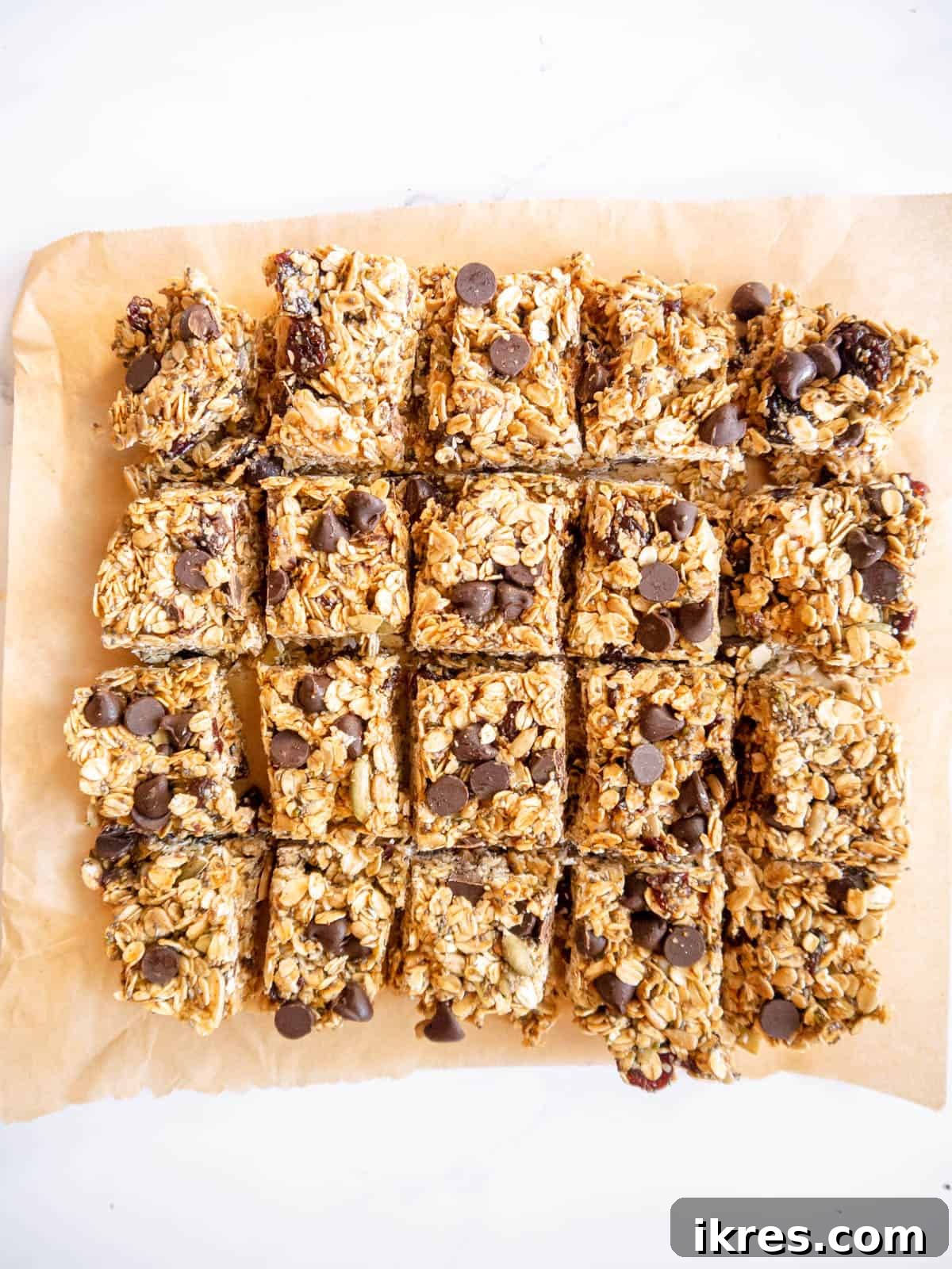 Quick & Creamy Gluten-Free Almond Butter Energy Bars 9 Homemade granola bars cut into smaller square shapes, offering an alternative to traditional bar cuts.