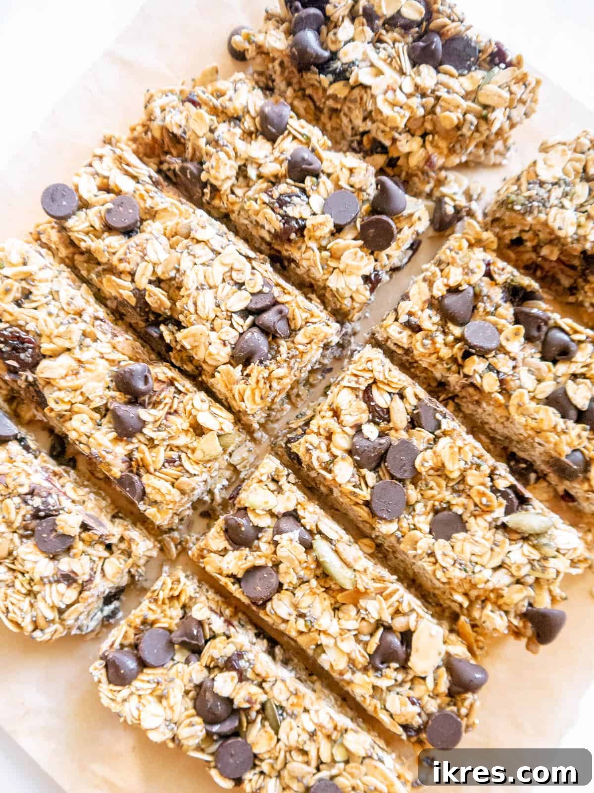 Effortless Gluten-Free Almond Butter Energy Bars 10 Side angle of no bake gluten-free almond butter granola bars freshly cut and stacked.