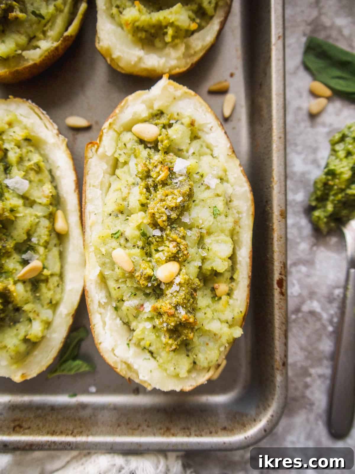 Paleo Whole30 Pesto Twice-Baked Potato Boats 3 Paleo Whole30 Twice Baked Pesto Potatoes - Healthy, gluten-free, and packed with flavor.