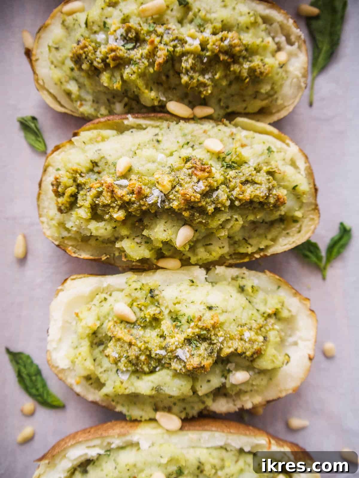 Paleo Whole30 Pesto Twice-Baked Potato Boats 5 Paleo Whole30 Twice Baked Pesto Potatoes - Homemade pesto being made in a food processor.