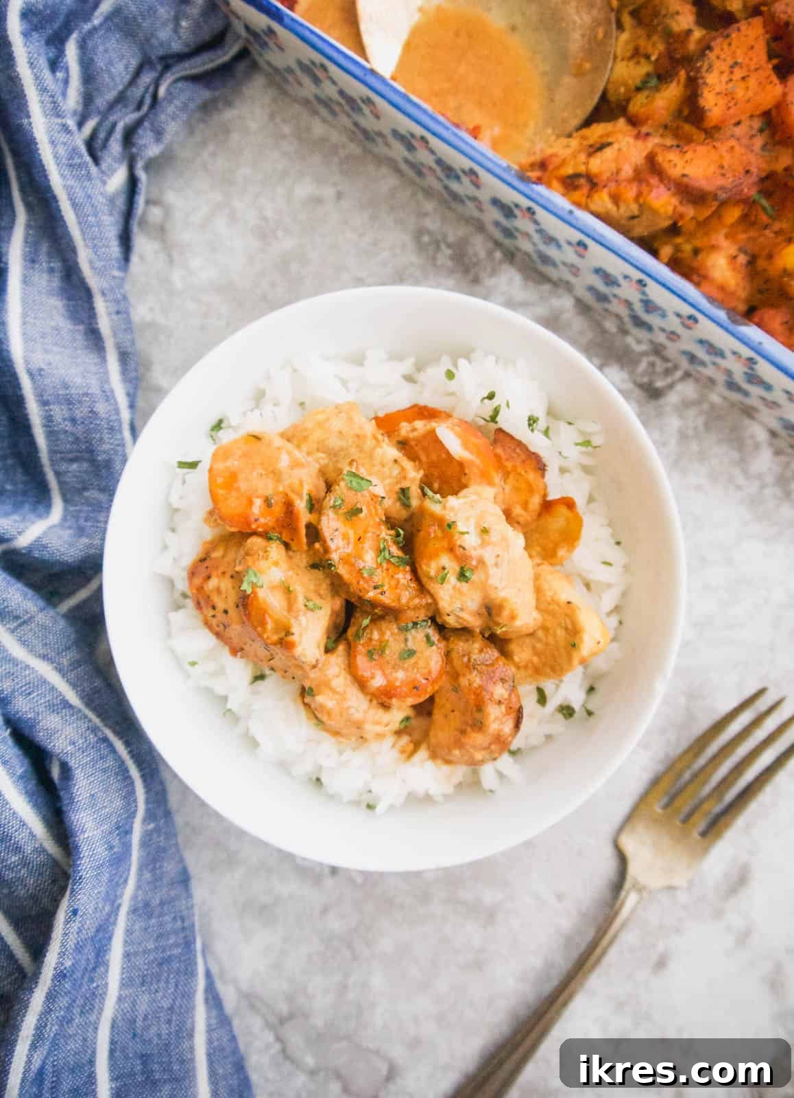 Zesty Dairy-Free Chicken Bake 11 A dairy-free, gluten-free chicken casserole with tomato mustard sauce, beautifully plated in a bowl, ready to be enjoyed as a wholesome meal.