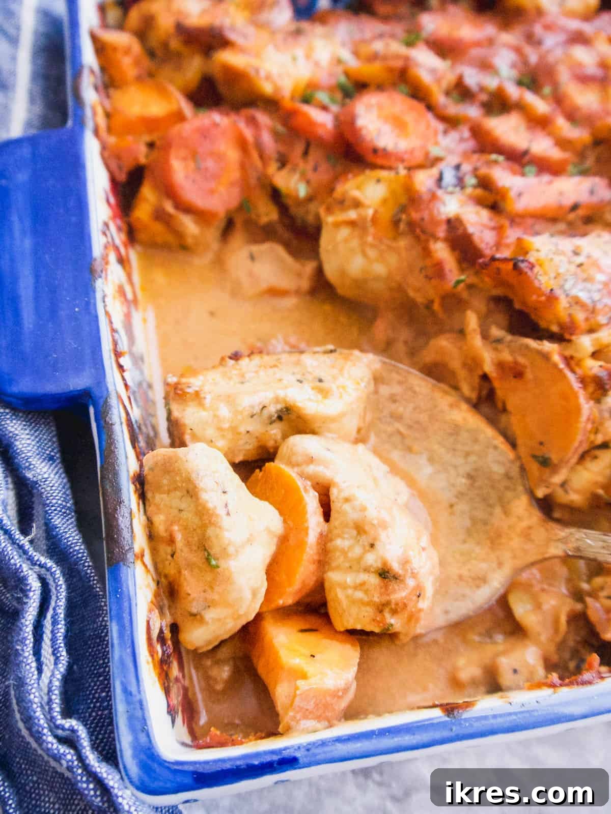 Zesty Dairy-Free Chicken Bake 10 Baked chicken tomato casserole, golden brown and bubbling, fresh out of the oven, ready to serve.