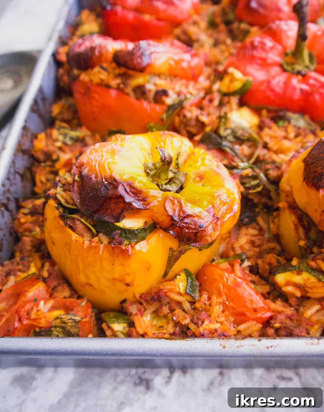 Close-up of perfectly baked Zucchini, Spinach, Meat and Rice Stuffed Peppers (GF)