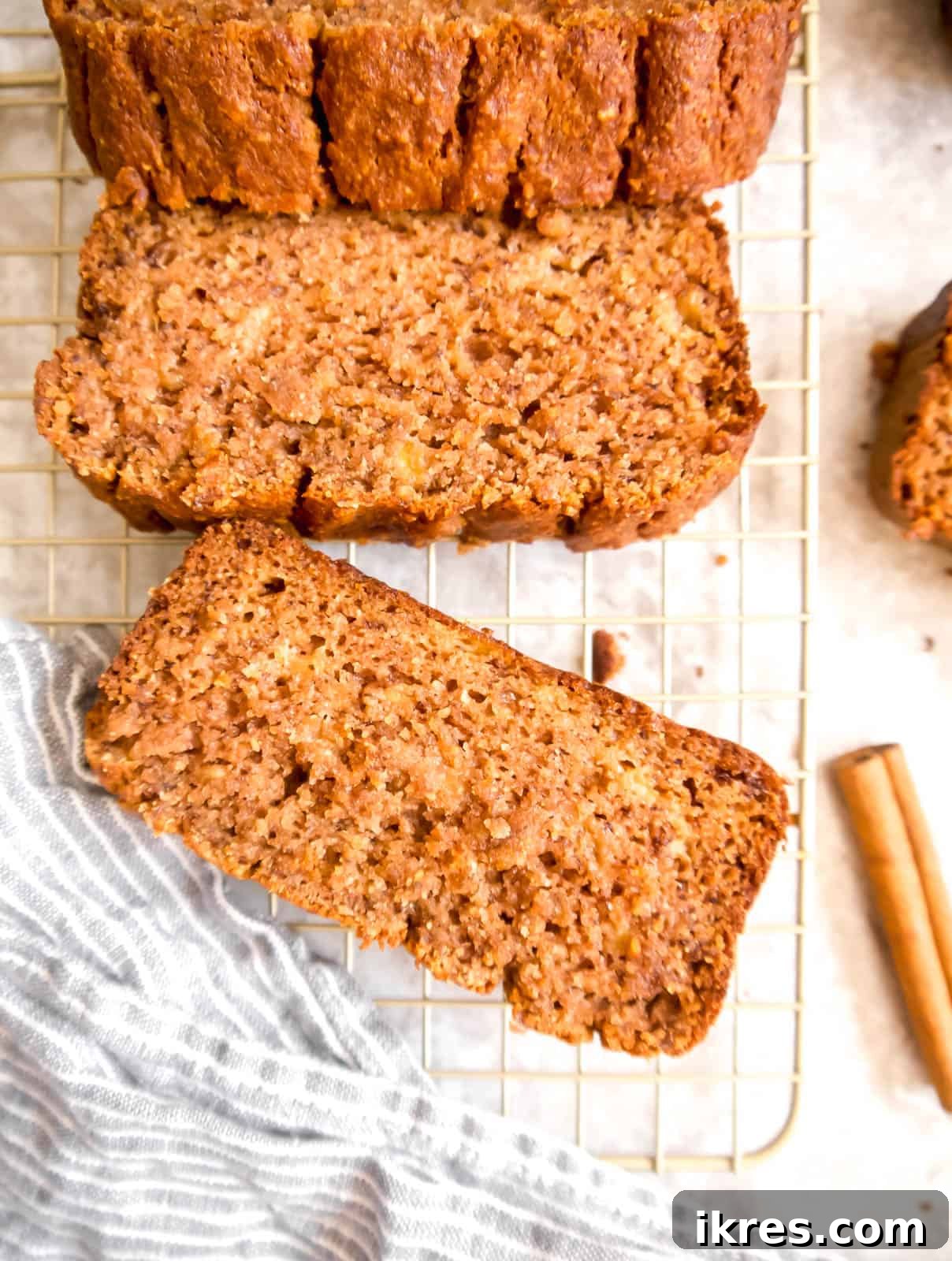 Paleo Banana Bread Grain and Dairy Free 11 Banana bread with almond flour slices on a drying rack, ready to be enjoyed.