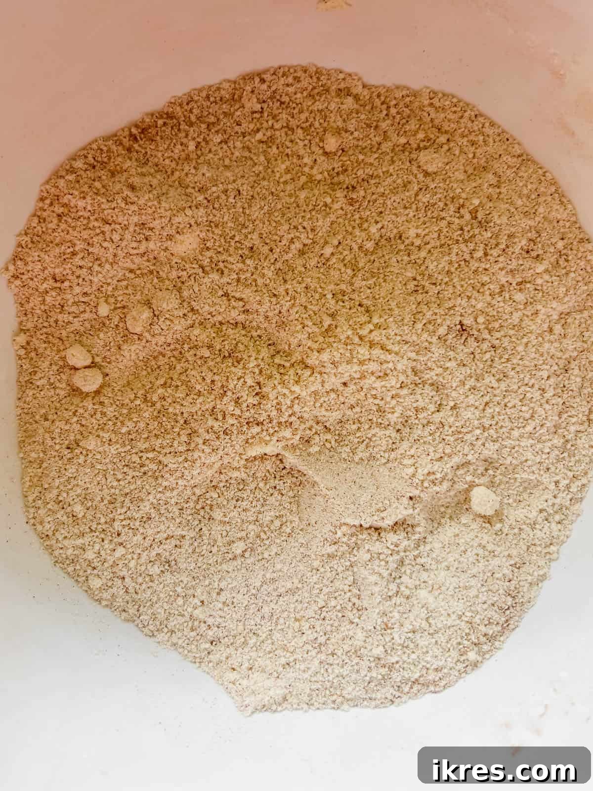 Paleo Banana Bread Grain and Dairy Free 7 Dry ingredients like almond flour, tapioca flour, coconut flour, baking soda, salt, and cinnamon mixed together in a separate bowl.