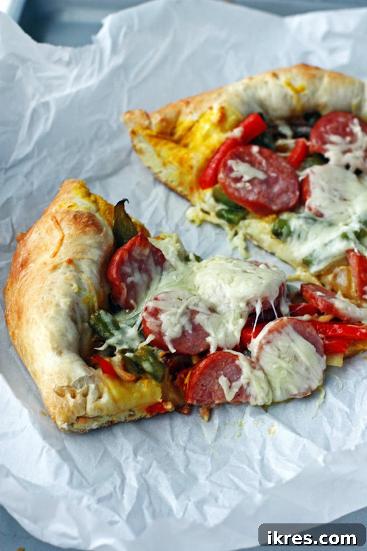 Supreme Pizza Perfection 6 Slices of Supreme Pizza on parchment paper