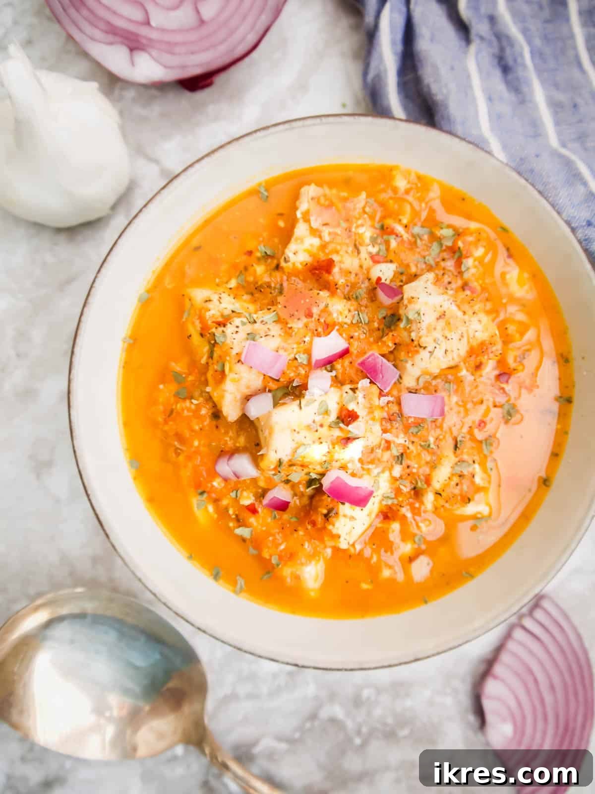 Cherry Tomato Sauce with Chicken in a rustic bowl, garnished beautifully.