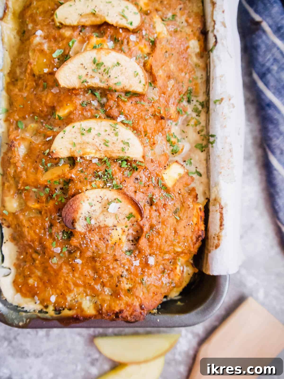 The fully cooked ground turkey and apple meatloaf, sliced and ready for serving.