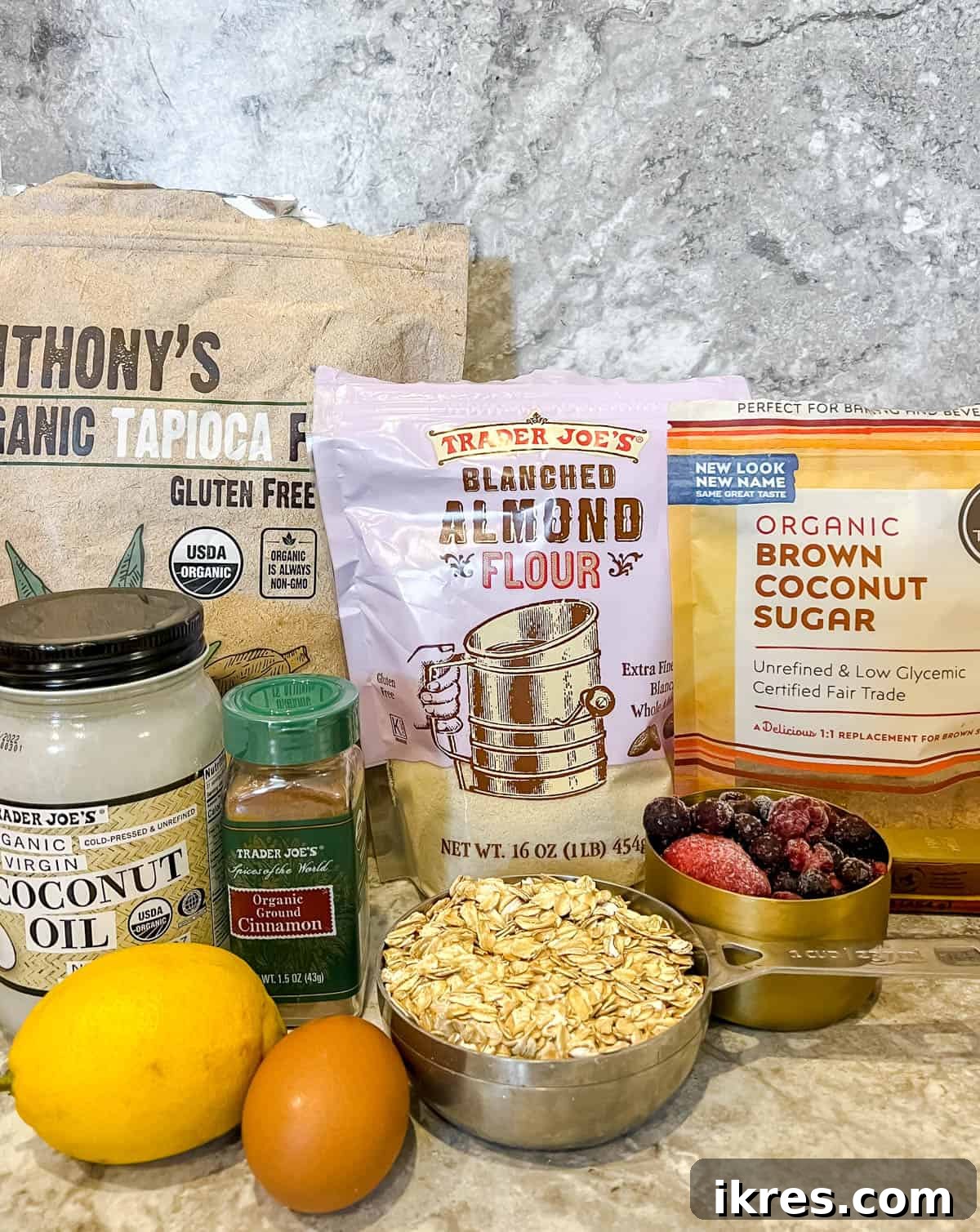 Delicious Gluten-Free Dairy-Free Berry Oat Bars 4 All the fresh ingredients laid out for making Gluten-free Berry Oatmeal Bars: berries, flours, oats, sugar, oil, and spices.
