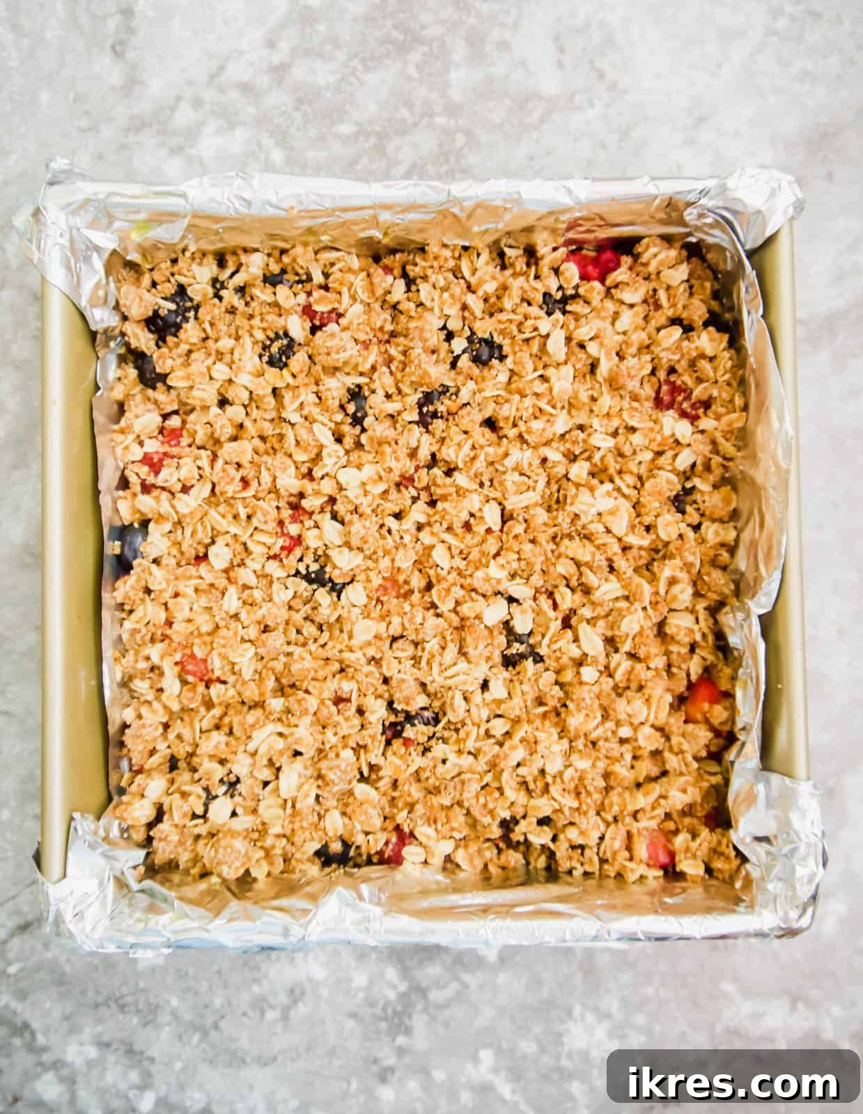 Delicious Gluten-Free Dairy-Free Berry Oat Bars 7 The reserved oat crumble sprinkled on top of the berry layer.