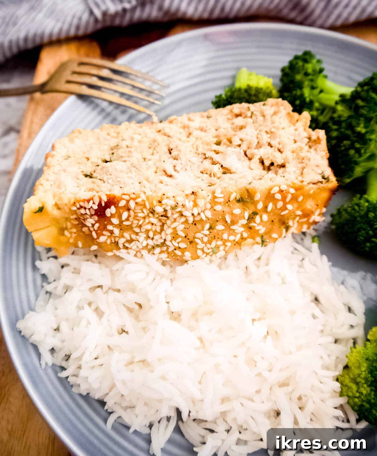 Healthy meatloaf recipe with honey and sesame seasoning, perfectly baked and golden brown.