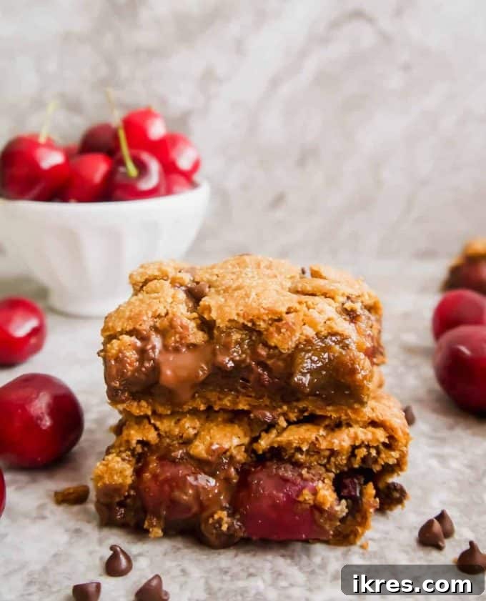 Paleo Gluten-Free Cherry Chocolate Chip Squares 2 Paleo Gluten-Free Chocolate Chip Cherry Cookie Bars: Deliciously ooey-gooey and grain-free dessert bars bursting with warm cherries and chocolate chips.