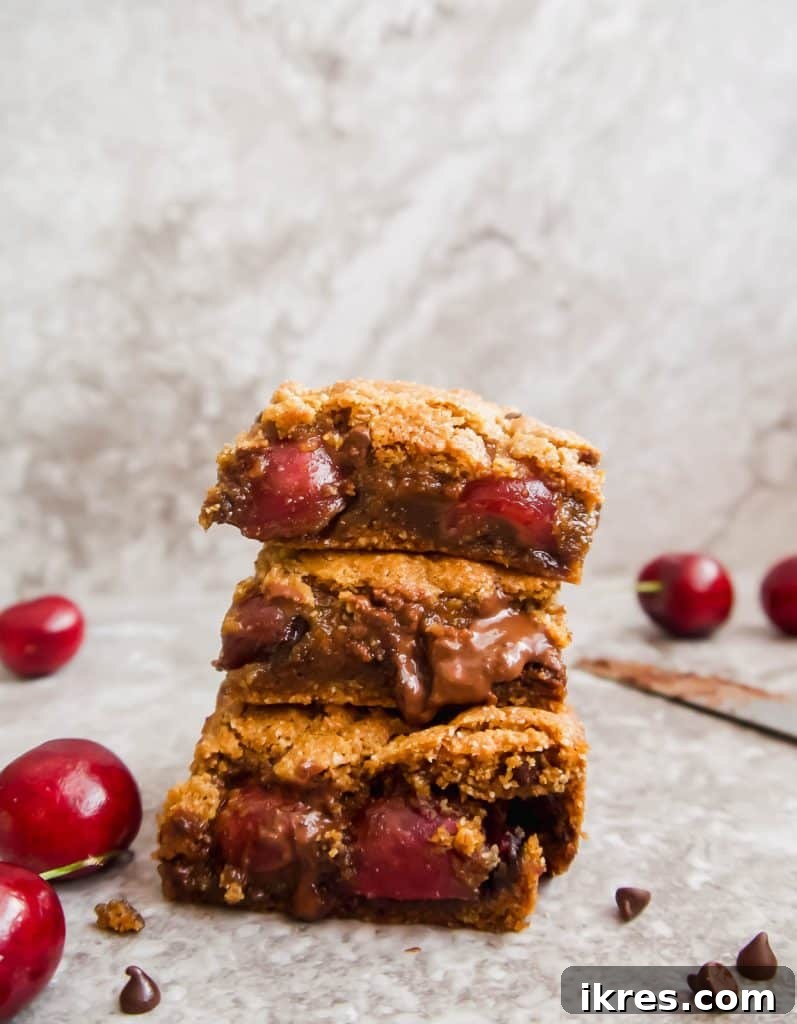 Paleo Gluten-Free Cherry Chocolate Chip Squares 5 Mixing dry ingredients in one bowl and wet ingredients in another for the cookie bars.