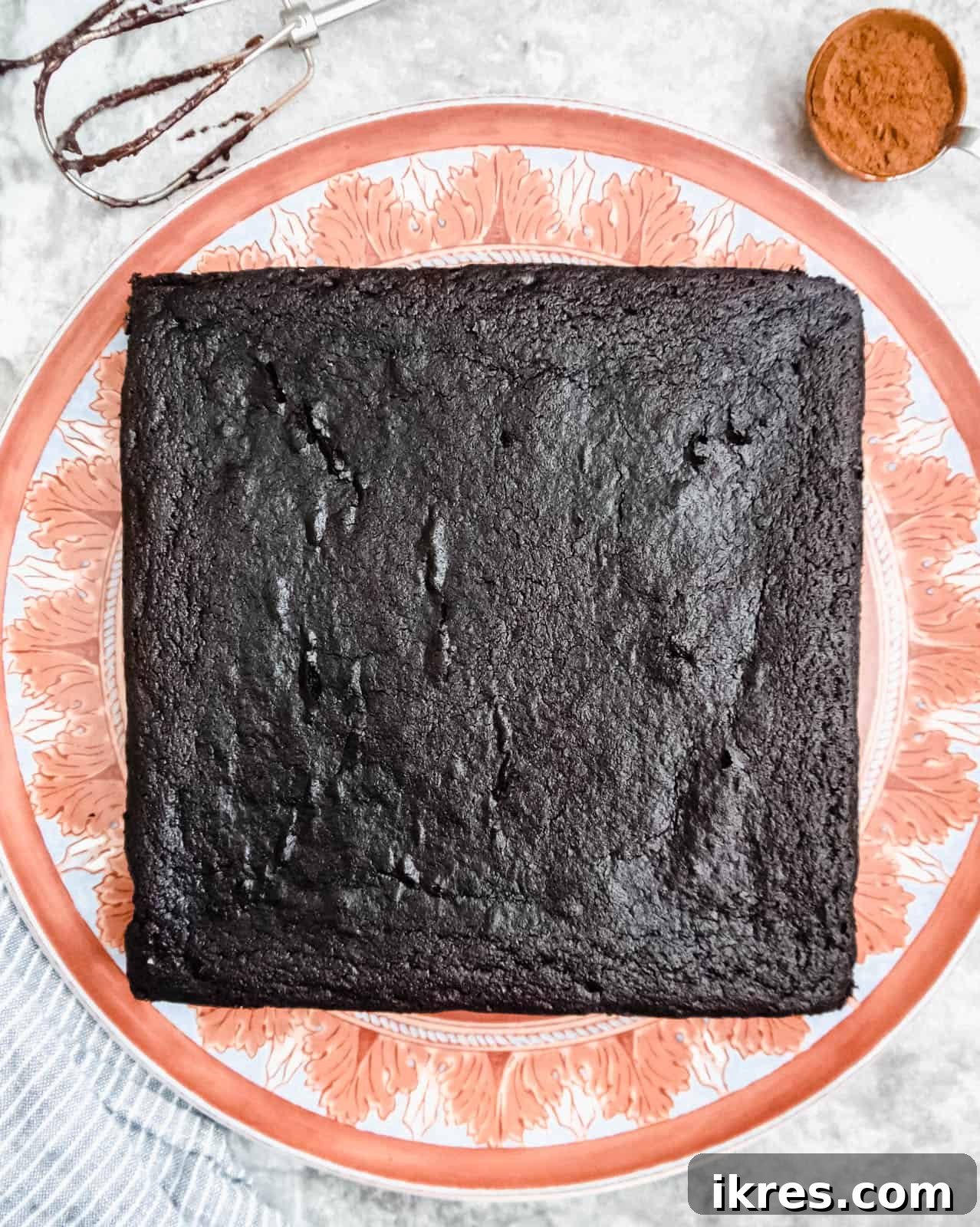 Paleo One Bowl Chocolate Fudge Cake Dairy Free Gluten Free 7 Pouring wet ingredients into dry for healthy cake