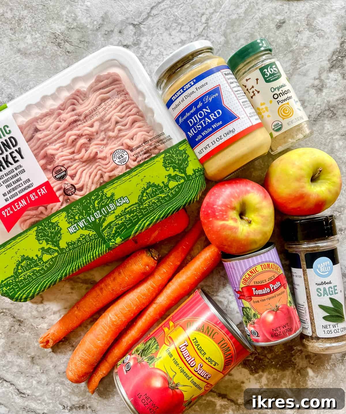 Assorted ingredients laid out for making the healthy ground turkey shepherd's pie filling.