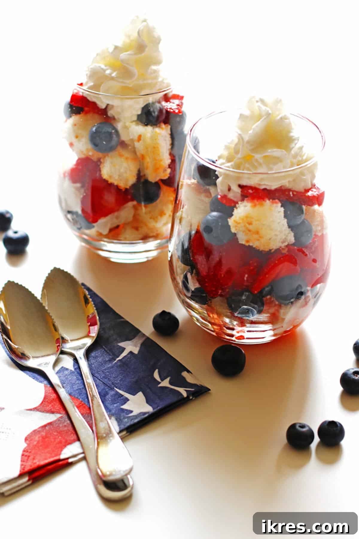 Strawberry Angel Delight 14 Red white and blue strawberry shortcakes with blueberries and strawberries.