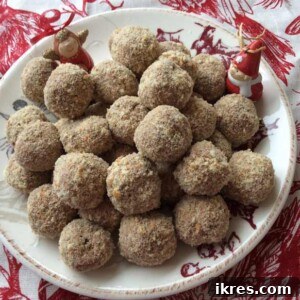 Decadent Chocolate Mousse Bites 7 Finished chocolate mousse balls on a plate.