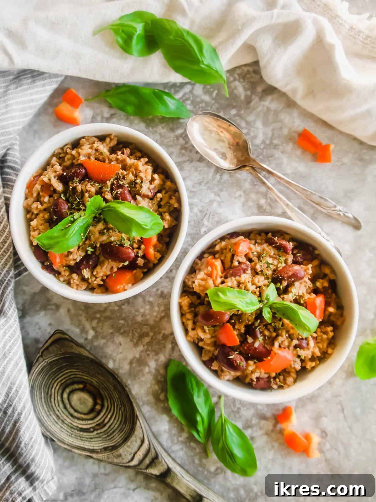 One Pot Wonder Ground Turkey Rice and Beans Gluten Free 9 Two generous servings of turkey rice and beans in white bowls, ready to be enjoyed.