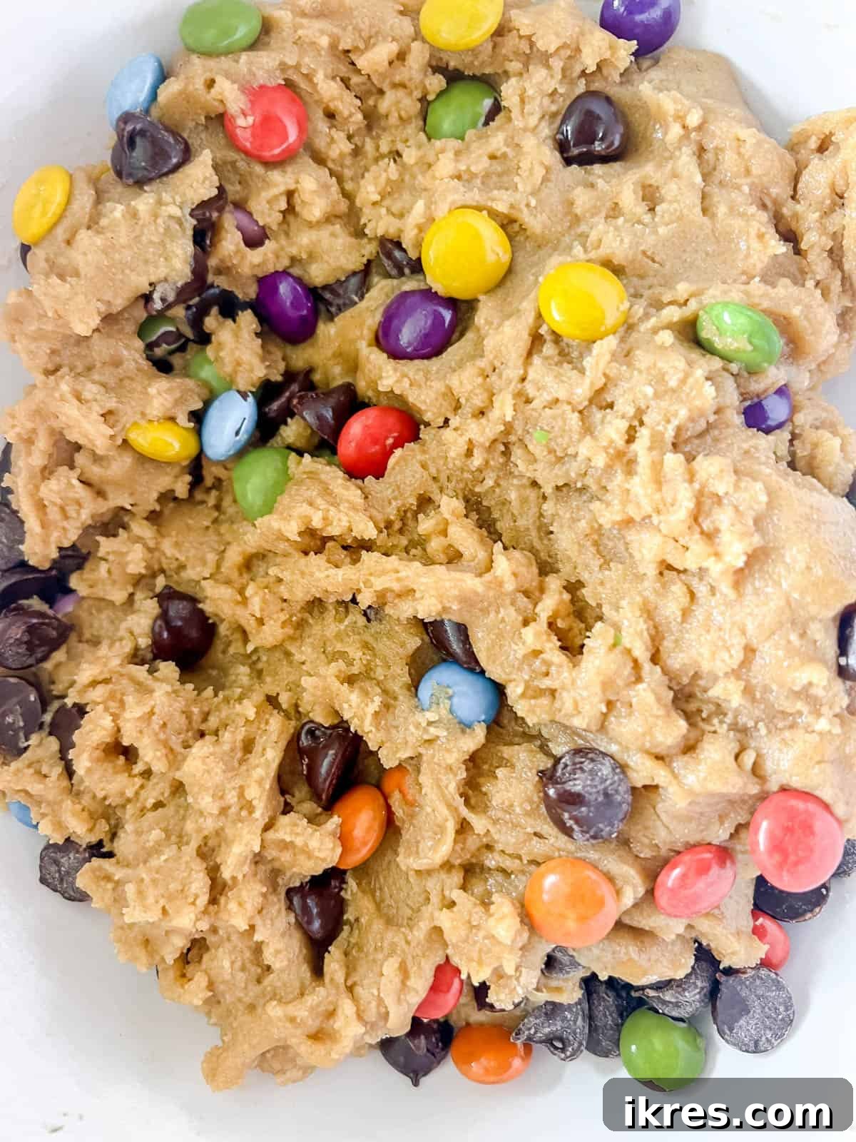 Ultimate Gluten-Free Dairy-Free Chocolate Chip Cookie Bars 7 Raw cookie bar dough with chocolate chips folded in.