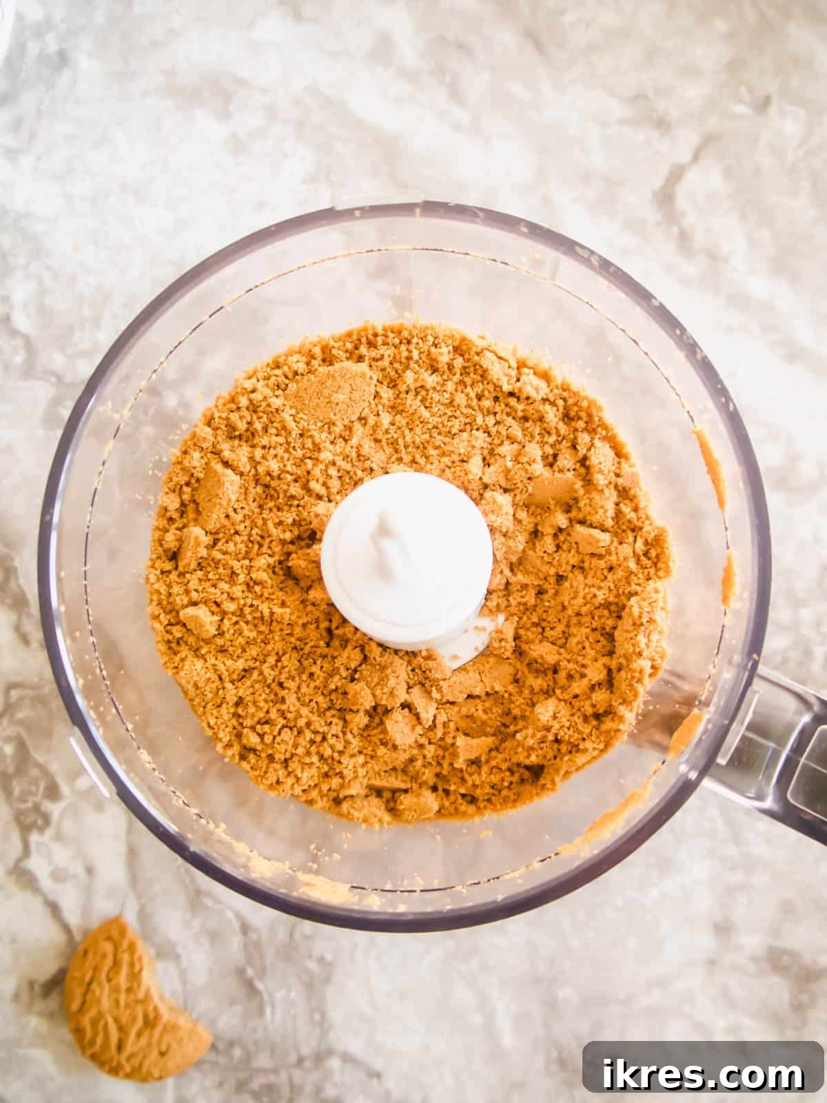 Decadent Gluten-Free Dairy-Free Chocolate Mousse Truffles 5 Crushed Simple Mills Cinnamon Cookies in a food processor, ready for coating the mousse balls.