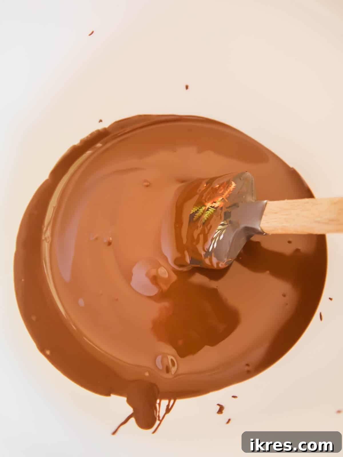 Decadent Gluten-Free Dairy-Free Chocolate Mousse Truffles 6 Melted dairy-free chocolate in a pan, smooth and glossy.