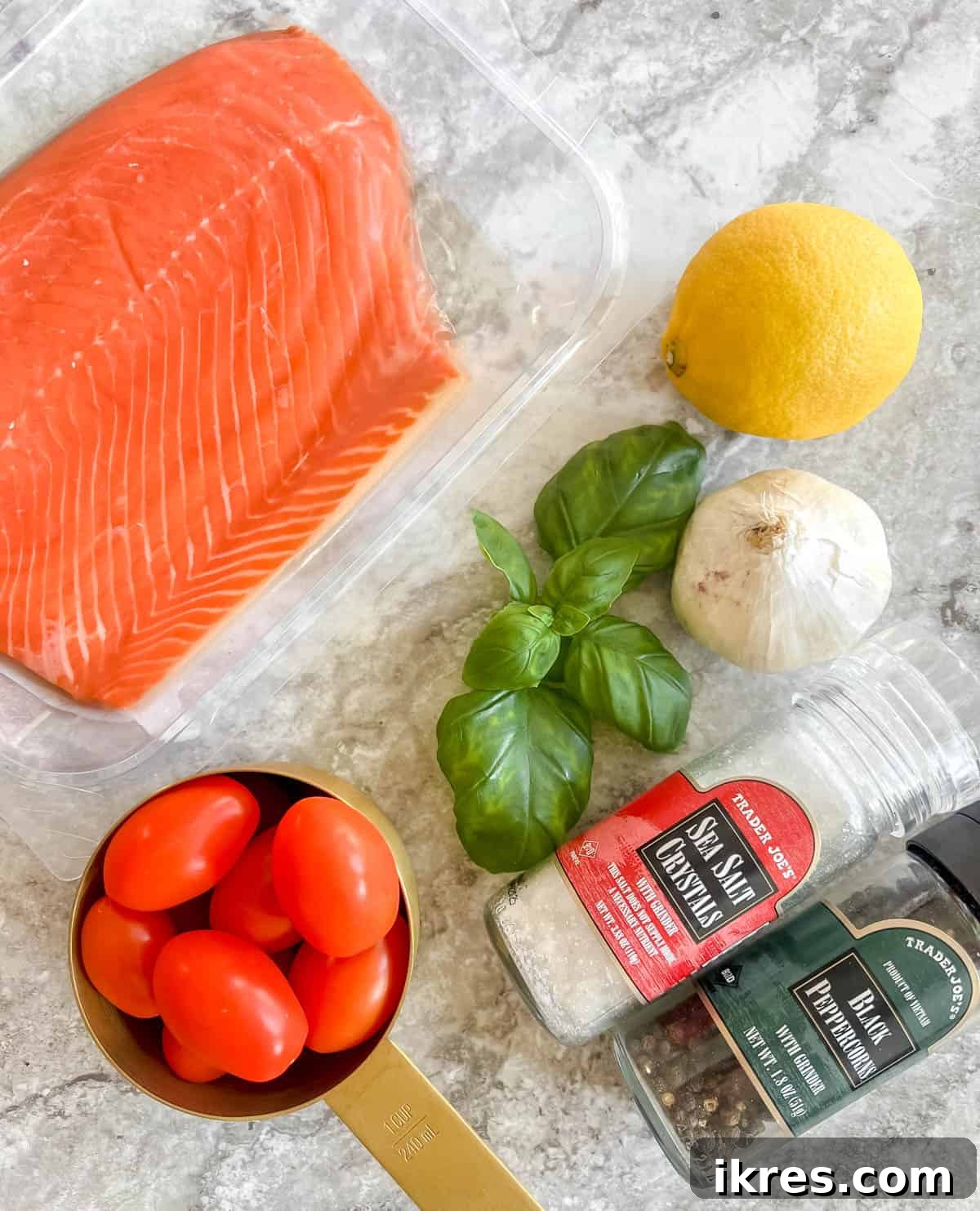 Basil Tomato Salmon Foil Packets 4 Ingredients needed to make Oven Baked Basil Tomato Salmon in Foil: salmon fillets, garlic, cherry tomatoes, lemon, fresh basil, olive oil, salt, pepper.