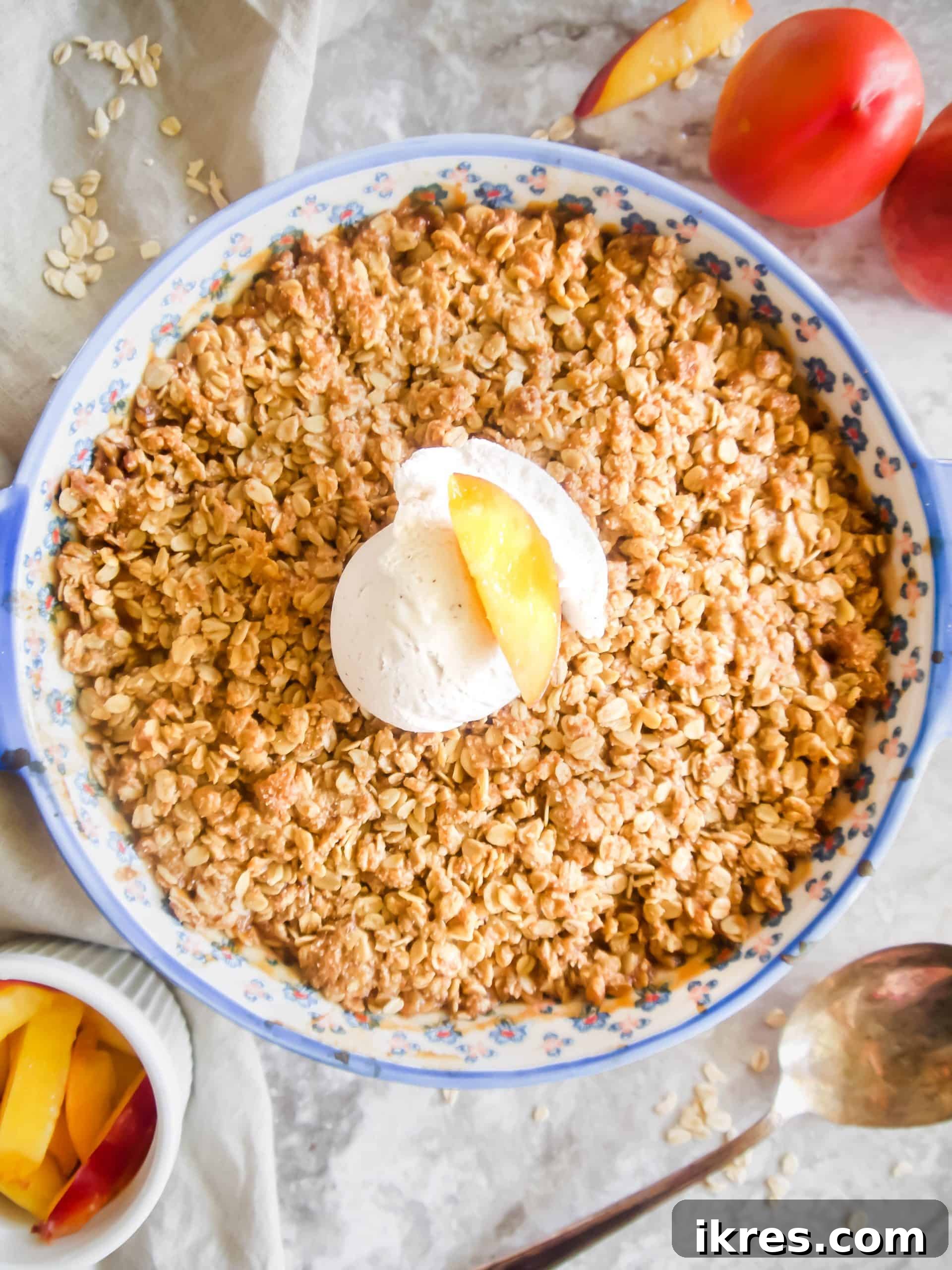 Nectarine Sunshine Crumble Gluten Free Dairy Free 3 Freshly baked Nectarine Crisp, glistening with fruit juices, served with a scoop of vanilla ice cream on top.
