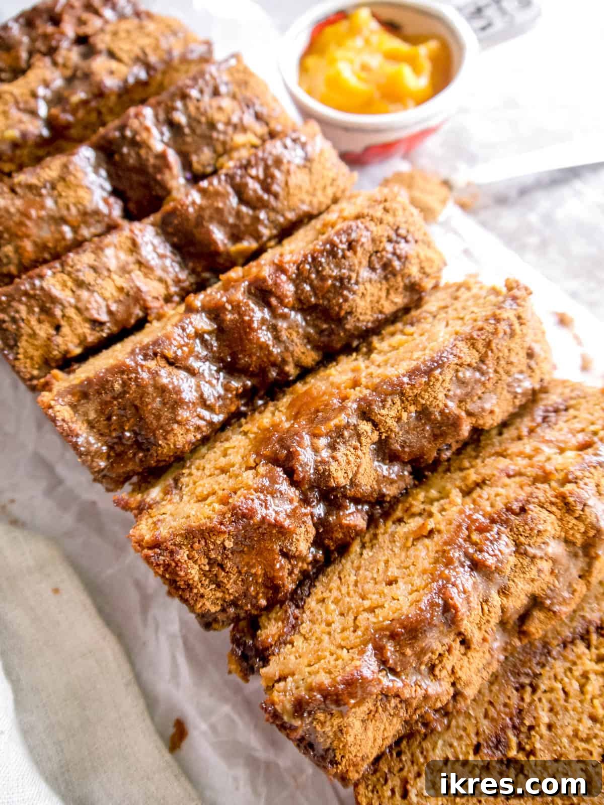 Wholesome Paleo Cinnamon Swirl Pumpkin Banana Bread 6 A freshly baked Paleo banana bread, enriched with pumpkin and cinnamon, glazed and ready to eat.