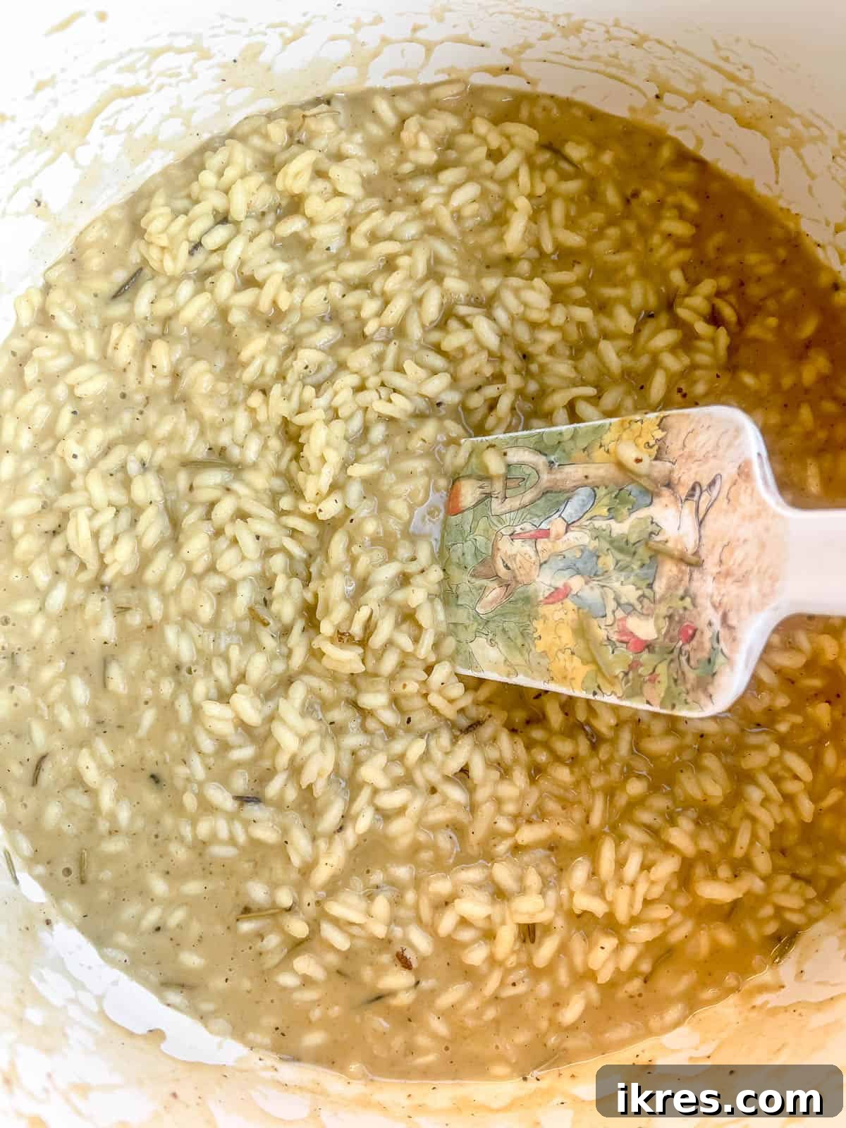 Creamy, fully cooked risotto in a pot after all the broth has been absorbed, showcasing its perfect texture.