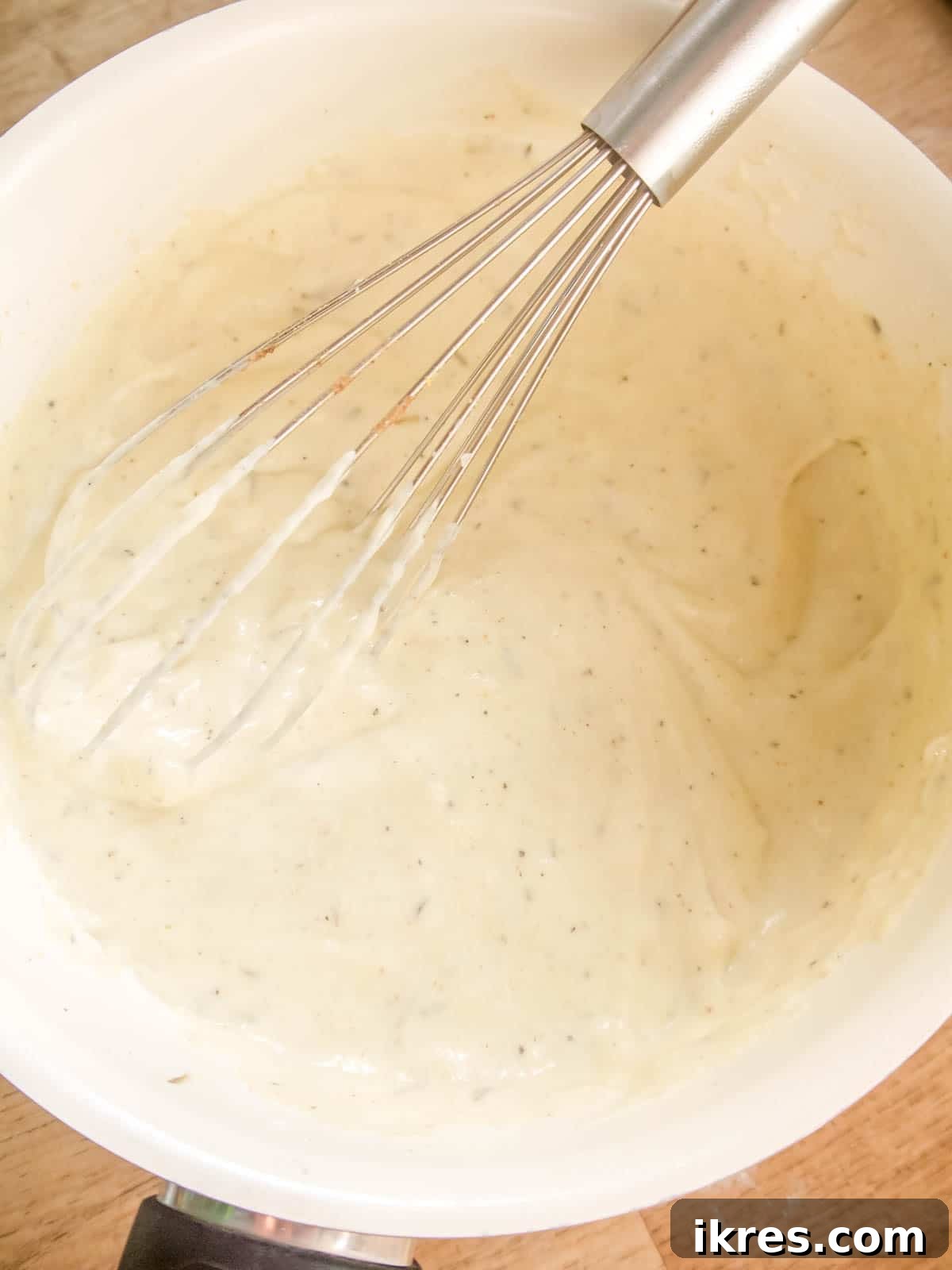 Vegan Paleo Dairy Free Cauliflower Bake 8 The fully prepared creamy vegan sauce for the cauliflower gratin, thick and ready to be poured over the cauliflower.