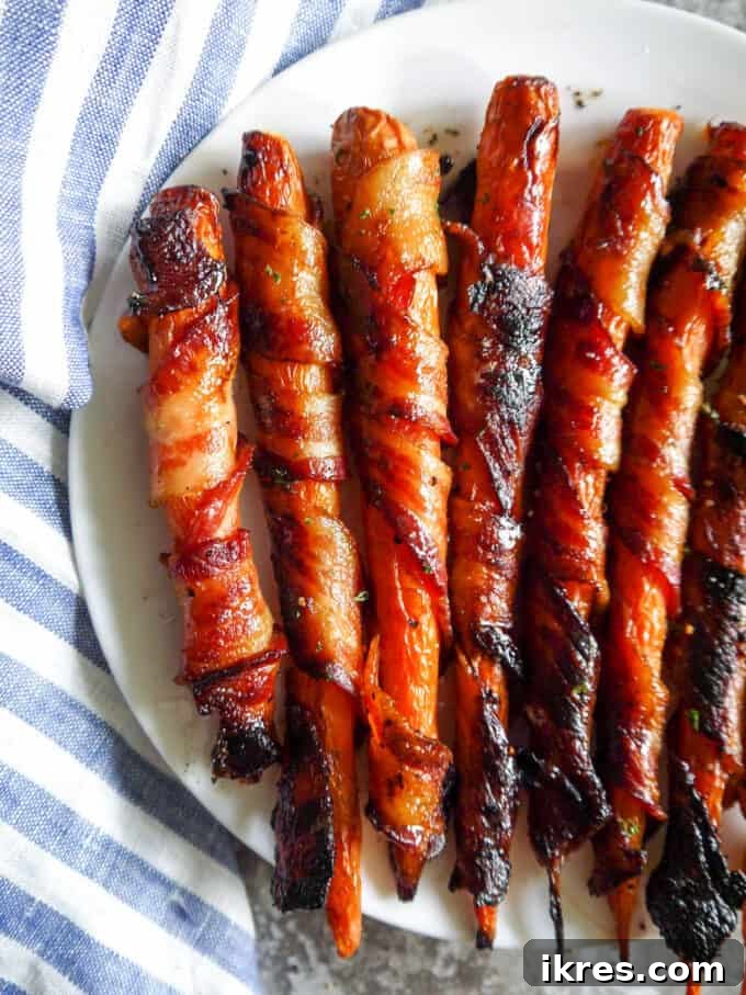 Close-up of Maple Bacon Wrapped Carrots showcasing the crispy texture.