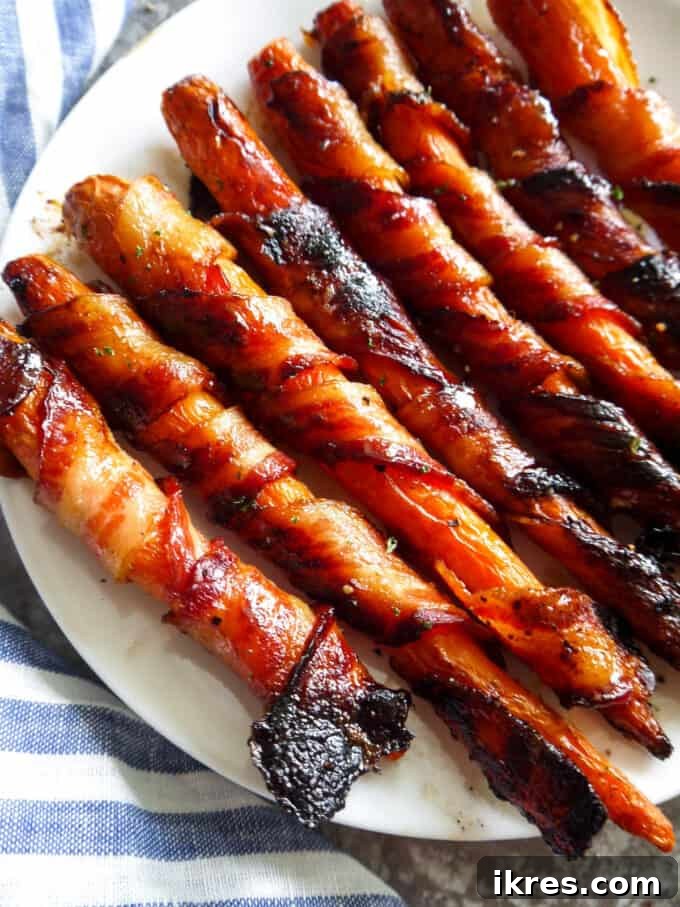 Plated Maple Bacon Wrapped Carrots, ready for a meal or appetizer spread.