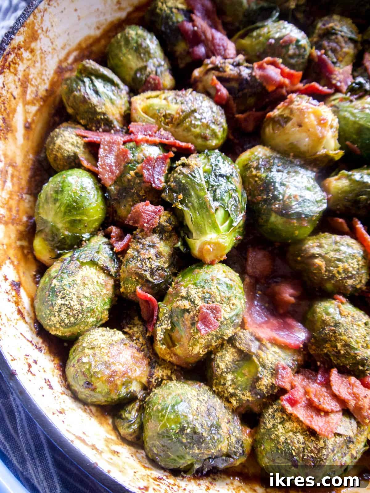 Wholesome Brussels Sprouts Bake Paleo Whole30 11 A savory Whole30 compliant Brussels sprout dish, with tender sprouts and scattered bacon, served in an oven-safe pan, ready to be enjoyed.