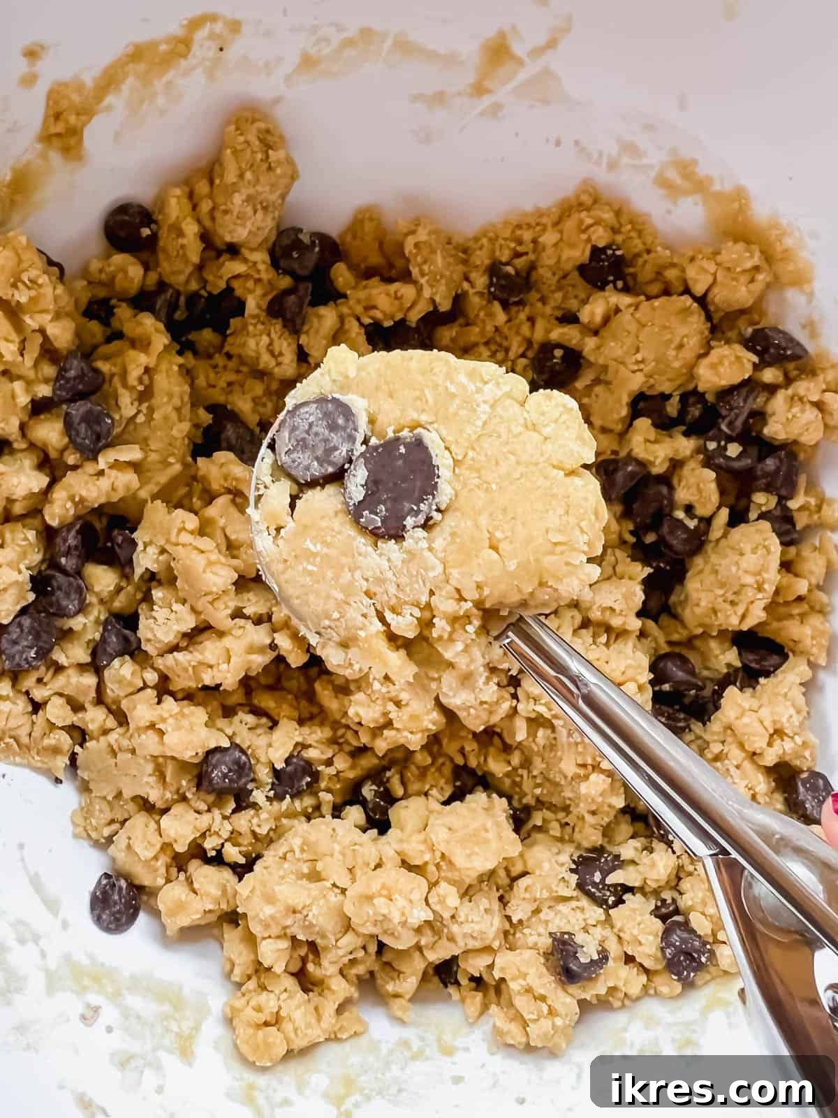 Plant Based Olive Oil Chocolate Chip Cookies 7 Dough balls on a cookie sheet, ready for baking.
